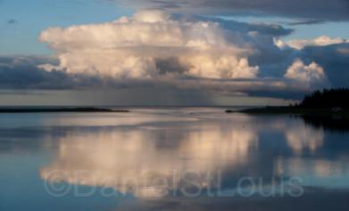 Clouds on the water in Grand Barachois, NB.