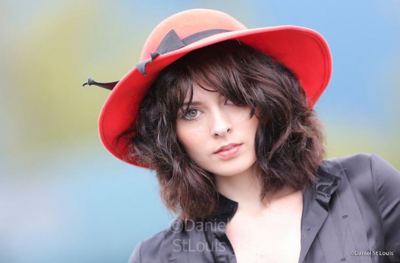 Model wearing red hat in Halifax.